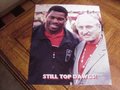 Picture: Herschel Walker and Vince Dooley of the Georgia Bulldogs at a 1980 National Championship Team Reunion "Still Top Dawgs" original 8 X 10 photo.