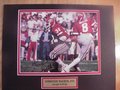 Picture: Herschel Walker Georgia Bulldogs hand-signed 8 X 10 photo as Buck Belue hands off the football to him professionally double matted to 11 X 14 with identification plate as well. The autograph is absolutely guaranteed authentic and comes with a Certificate of Authenticity from us. We just traded to get this from a store who did a Herschel signing with us a few years ago so we also have a picture of Herschel signing this photo as well.