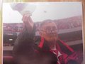 Picture: Larry Munson says "Goodbye" to Georgia Bulldogs fans at Sanford Stadium original 20 X 30 poster. We are the exclusive copyright holders of this image. If you see this exact photo anywhere else it is a copy!