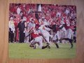 Picture: Leonard Floyd Georgia Bulldogs original 8 X 10 photo against Clemson professionally double matted in team colors to 11 X 14. We are the copyright holders of this image and the quality and clarity is fantastic. Matting not shown in picture.