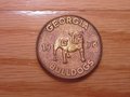 Picture: Georgia Bulldogs original 1978 Schedule Coin is 1 1/2 X 1 1/2 and five inches around. Very rare item from 36 years ago with the school's 1978 schedule on back. We have just one!