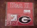 Picture: UGA II Georgia Bulldogs factory sealed pin with bio of the dog on back of Kodak Card.