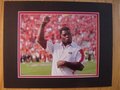 Picture: 2014 Herschel Walker Georgia Bulldogs original 8 X 10 photo against Clemson professionally double matted in team colors to 11 X 14. We are the copyright holders of this image and the quality and clarity is fantastic