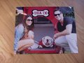 Picture: Josh Murray and Andi Dorfman from "The Bachelorette" with UGA IX of the Georgia Bulldogs original 20 X 30 poster. Josh Murray, like his brother Aaron, played for the Georgia Bulldogs! We are the exclusive copyright holders of this image and own the original negative.