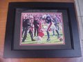 Picture: UGA V Barks at Auburn's Robert Baker original 1996 "Victory on the Plains" 8 X 10 photo professionally double matted in team colors to 11 X 14 and framed in very nice black wood to 14.5 X 17.5.