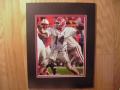 Picture: David Greene autographed this original 8 X 10 glossy photo and added "42nd win" to his signature since this Outback Bowl win was his Division 1-A record setting 42nd win. This photo has been professionally double matted in Georgia black on red to 11 X 14 so that it fits a standard frame. The autograph is absolutely guaranteed authentic and comes with a Certificate of Authenticity.   