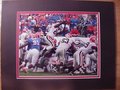 Picture: Knowshon Moreno hand-signed Georgia Bulldogs 8 X 10 photo of his leaping touchdown against Florida that led to the celebration professionally double matted to 11 X 14 so that it fits a standard frame. The autograph is absolutely guaranteed authentic and comes with a Certificate of Authenticity from GeorgiaBulldogsPrints.com.