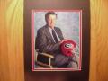 Picture: Larry Munson with the great Georgia Bulldogs Helmet original 8 X 10 photo professionally double matted to 11 X 14 so that it fits a standard frame.