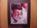 Picture: Larry Munson "At the Microphone" Georgia Bulldogs original 8 X 10 photo professionally double matted to 11 X 14 so that it fits a standard frame.