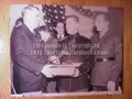 Picture: Frank Sinkwich of the Georgia Bulldogs receives the 1942 Heisman Trophy original 20 X 30 poster.