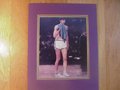 Picture: "Pistol" Pete Maravich LSU Tigers original 8 X 10 color photo professionally double matted in LSU colors to 11 X 14.
