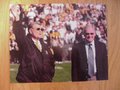 Picture: Hayden Fry Iowa Hawkeyes "Goodbye" original 8 X 10 photo with Bo Schembechler of the Michigan Wolverines.