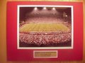 Picture: Arkansas Razorbacks Donald W. Reynolds Razorback Stadium-Frank Broyles Field original 8 X 10 photo double matted to 11 X 14 with a gold-colored identification plate.