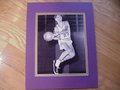 Picture: Pete Maravich LSU Tigers original 8 X 10 photo from the 1960's professionally double matted in LSU colors to 11 X 14 so that it fits a standard frame.