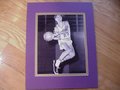 Picture: Pete Maravich LSU Tigers original 8 X 10 photo from the 1960's professionally double matted in LSU colors to 11 X 14 so that it fits a standard frame.