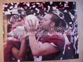 Picture: Alabama Crimson Tide 2011 BCS National Championship photo/print of a player kissing the 2011 National Championship Football Crystal.