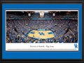 Picture: Kentucky Wildcats Basketball Rupp Arena 13.5 X 40 panoramic print professionally double matted in team colors and framed to 18 X 44. This panorama, taken at Rupp Arena by Christopher Gjevre, features the University of Kentucky Wildcats basketball team playing to a sellout crowd. Opening in 1976, this off-campus arena is the largest ever built for basketball. Its unique design consists of bleachers in the upper bowl, without luxury suites or a center-mounted scoreboard. It seats 23,500, frequently packing in over 24,000 fans with a student standing-room area called the "eRUPPtion Zone." This intimidating venue consistently ranks first in home game attendance. Kentucky basketball began in 1903 and has an unprecedented winning history. Founded in 1865 in Lexington, Kentucky, the University enrolls over 27,000 students.