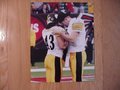 Picture: Ben Roethlisberger and Troy Polamalu of the Pittsburgh Steelers pray together before a game original 8 X 10 photo. We are the exclusive copyright holders of this image