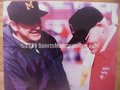 Picture: Woody Hayes of the Ohio State Buckeyes and Bo Schembechler of the Michigan Wolverines 16 X 20 poster/photo.