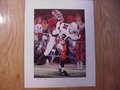 Picture: Alabama Crimson Tide 1993 "Strip Play" shows George Teague make a great play on a Miami receiver to help Alabama win the 1992 National Championship. This print is signed by artist Doug Hess.