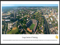 Picture: Georgia Tech Yellow Jackets Bobby Dodd Stadium 13.5 X 40 panoramic print professionally framed to 13.75 X 40.25. This aerial panorama of Georgia Institute of Technology, taken by George Pearl, spotlights Bobby Dodd Stadium at Historic Grant Field. Originally built in 1913 by the Georgia Tech student body, it is the oldest on-campus stadium in NCAA Division I-A. Known as Grant Field since 1914, the name Bobby Dodd Stadium was added in April 1988, in honor of the legendary coach. A stadium expansion was completed in 2003, raising capacity to 55,000 seats. The Yellow Jackets football team, which began in 1892, has won a total of 15 ACC titles, 4 national titles and has played in 35 bowl games. With more than 18,000 students, Georgia Tech occupies 400 acres in the heart of Atlanta.