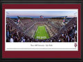 Picture: Just out from the 2015 season! Texas A & M Aggies Kyle Field 13.5 X 40 panoramic poster professionally double matted in team colors and framed to 18 X 44. This panorama, taken by Christopher Gjevre, features the stunning $485 million redevelopment of Kyle Field and the rich traditions that accompany an evening of Texas A&M football. The Spirit of Aggieland is alive and well at the Home of the 12th Man. This Texas A&M tradition is familiar to sports fans throughout the country and came to life in 1922, when the Aggie football team suffered so many injuries in the Dixie Classic that the coach was compelled to call a student – E. King Gill – out of the stands to suit up and stand on the sidelines, ready to play. Today, Aggies continue to stand ready and willing to support their team, as evidenced by more than 31,000 students standing throughout the entire game.