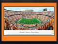 Picture: Just out from the 2015 season! Tennessee Volunteers Neyland Stadium 13.5 X 40 panoramic poster professionally double matted in team colors and framed to 18 X 44. This panorama, taken by Robert Pettit, spotlights the excitement of the season’s home opener between the Tennessee Volunteers and the Oklahoma Sooners at one of college football's most iconic landmarks, Neyland Stadium. A Tennessee trademark, the “checkerboard” seen depicted in the crowd is only the second ever in Neyland Stadium history, and is no easy feat when considering that at capacity, 102,455 fans are in attendance for game day festivities. The standout orange and white colors have represented the Volunteers since their inaugural season in 1891, when they were selected by team member, Charles Moore. The colors were those of the common American daisy which grew in profusion on The Hill.