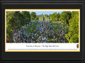 Picture: Missouri Tigers Tiger Walk panoramic print professionally double matted in team colors and framed. This panorama of Tiger Walk honors one of the cherished traditions of University of Missouri graduates. It was taken August 24, 2014, during the university’s 175th anniversary. Freshmen run through the Columns toward Jesse Hall during Tiger Walk to symbolize their entrance into the university and the start of a new academic year. MU faculty, staff and alumni volunteers greet them with Tiger Stripe ice cream, and Marching Mizzou performs a concert. The words of the university’s alma mater capture the spirit: “Proud art thou in classic beauty, of thy noble past; with thy watchwords, honor, duty, thy high fame shall last.”