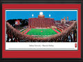 Picture: Indiana Hoosiers Memorial Stadium 13.5 X 40 panoramic poster professionally double matted in team colors and framed to 18 X 44. This panorama of Memorial Stadium, taken by Christopher Gjevre, highlights the action of an Indiana Hoosiers football game. Memorial Stadium, located in Bloomington, Indiana, opened in 1960. It replaced the "old" Memorial Stadium, a 20,000 seat stadium built in 1925. After many renovations, seating capacity now holds 52,692. The Hoosiers football program began in 1887 and competes in the Big Ten Conference. Established in 1820 as the Indiana State Seminary, eight years later the name was changed to Indiana College and officially changed to Indiana University in 1838. Indiana University enrolls 107,000 plus students at all IU campuses.