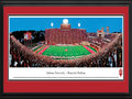 Picture: Indiana Hoosiers Memorial Stadium 13.5 X 40 panoramic poster professionally double matted in team colors and framed to 18 X 44. This panorama of Memorial Stadium, taken by Christopher Gjevre, highlights the action of an Indiana Hoosiers football game. Memorial Stadium, located in Bloomington, Indiana, opened in 1960. It replaced the "old" Memorial Stadium, a 20,000 seat stadium built in 1925. After many renovations, seating capacity now holds 52,692. The Hoosiers football program began in 1887 and competes in the Big Ten Conference. Established in 1820 as the Indiana State Seminary, eight years later the name was changed to Indiana College and officially changed to Indiana University in 1838. Indiana University enrolls 107,000 plus students at all IU campuses.