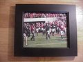 Picture: Kirby Smart leads the Georgia Bulldogs original and high quality 11 X 14 photo professionally framed in very nice black wood to 14 1/2 X 17 1/2