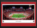 Picture: Ohio State Buckeyes 13.5 X 40 Panoramic Poster professionally double matted in team colors and framed to 18 X 44.The panoramic photo, taken on September 3, 2022, after the Buckeyes defeated Notre Dame Fighting 21-10, captured the tradition of Ohio State football players locking arms and standing together with the cheerleaders and football staff to sing "Carmen Ohio" in front of the marching band. This decades old song unites all Buckeyes, past and present. Affectionately known as the "Shoe", Ohio Stadium celebrates its centennial season in 2022 and is one of the most recognizable landmarks in all of sports. Since the opening game against Ohio Wesleyan on, October 7, 1922, more than 36 million fans have streamed through the stadium’s gates. With a seating capacity of 102,780, Ohio Stadium is one of the largest stadiums in the world, the fourth largest on-campus facility in the nation and is listed in the National Register of Historic Places.