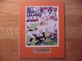 Picture: Peyton Manning Tennessee Volunteers 8 X 10 photo professionally double matted in team colors to 11 X 14 so that it fits a standard frame with a gold plate that reads "Peyton Manning, #16, Tennessee Volunteers."