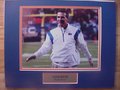 Picture: Urban Meyer Florida Gators 8 X 10 photo professionally double matted in team colors with name plate to 11 X 14 so that it fits a standard frame.