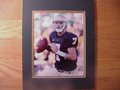 Picture: Jimmy Clausen Notre Dame Fighting Irish 8 X 10 glossy photo professionally double matted to 11 X 14 so that it fits a standard frame.