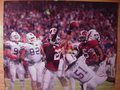 Picture: Alabama Crimson Tide 2009 SEC Champions image eight. We are the exclusive copyright holders of this image. Mark Ingram's touchdown makes Brandon Spikes fall down original 16 X 20 print.