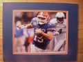 Picture: Tim Tebow in action final Florida Gators game 8 X 10 photo double matted to 11 X 14 so that it fits a standard frame.