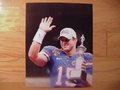 Picture: Tim Tebow final Florida Gators game with Tebow holding the Sugar Bowl Trophy 16 X 20 print.