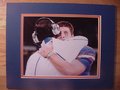 Picture: Tim Tebow final Florida Gators game with Urban Meyer 8 X 10 photo professionally double matted to 11 X 14 so that it fits a standard frame.