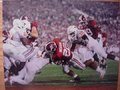 Picture: Alabama Crimson Tide 2009 National Championship 16 X 20 print features Mark Ingram scoring a touchdown against Texas. This print fits a standard frame so you can have a nice large framed National Championship piece at a very affordable price.