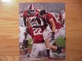 Picture: Alabama Crimson Tide 2009 National Champions 16 X 20 print features Mark Ingram scoring a touchdown against Texas with Colin Peek congratulating him. This print fits a standard frame so you can have a nice large framed National Championship piece at a very affordable price.