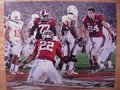 Picture: Alabama Crimson Tide 2009 National Championship 16 X 20 print features Mark Ingram scoring a touchdown against Texas with Colin Peek nearby. This print fits a standard frame so you can have a nice large framed National Championship piece at a very affordable price.