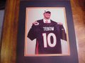 Picture: Tim Tebow Denver Broncos 8 X 10 photo professionally double matted in team colors to 11 X 14 so that it ftis a standard frame. If you want the photo double matted in Florida Gators colors just let us know and we can do that for you too!