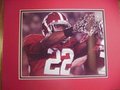 Picture: Mark Ingram proudly shows his Alabama Crimson Tide A's on the gloves on his hands 8 X 10 photo professionally double matted to 11 X 14 so that it fits a standard frame.