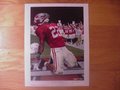Picture: Alabama Crimson Tide "Championship Passion" 2009 National Championship print of Alabama's 2010 Rose Bowl win over Texas featuring Mark Ingram signed by artist Doug Hess. You will receive a gold-embossed seal with this print normally reserved for large print.Great hidden meanings in this print including The Heisman Trophy hidden on the sidelines near Ingram's helmet, six fingers held up by Nick Saban and someone else for the record six Alabama All-Americans last year, player #57 for the record number of bowl games played in by Alabama, and #13 on the raised helmet for the number of National Championship won by Bama, and others!