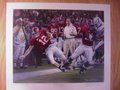 Picture: Daniel Moore original hand-signed "Champions" print features the Alabama Crimson Tide and their 2009 SEC Championship 32-13 win over Florida and features Greg McElroy and Nick Saban.