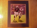 Picture: Cam Newton of the Auburn Tigers runs wild against Georgia original 8 X 10 photo professionally double matted in Auburn colors to 11 X 14.