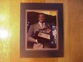 Picture: Cam Newton of the Auburn Tigers wins the 2010 Heisman Trophy original 8 X 10 photo professionally double matted in Auburn colors to 11 X 14.