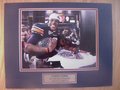 Picture: Cam Newton Auburn Tigers 2010 National Champions 8 X 10 photo double matted in team colors to 11 X 14 with a plate that reads "Auburn Tigers, 2010 National Champions, Auburn 22-Oregon 19."