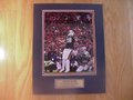 Picture: Wes Byrum kicks the winning field goal to make the Auburn Tigers 2010 National Champions 8 X 10 photo double matted in team colors to 11 X 14 with a plate that reads "Auburn Tigers, 2010 National Champions, Auburn 22-Oregon 19."